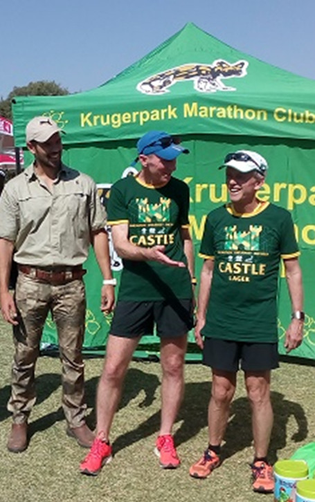 FordyceFusion partners Bruce Fordyce and Iain Morshead share a joke as Bruce hands over Iain’s prize for winning the 50+ category at the 2019 Skukuza 21 km